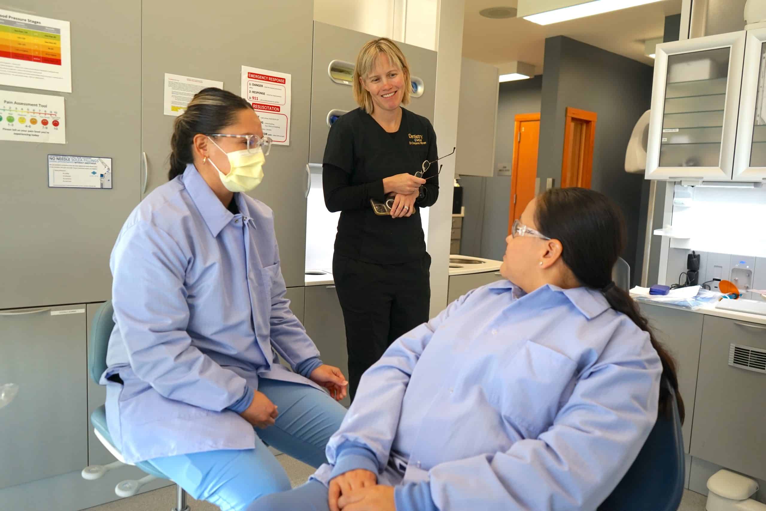 Dental therapists with patient