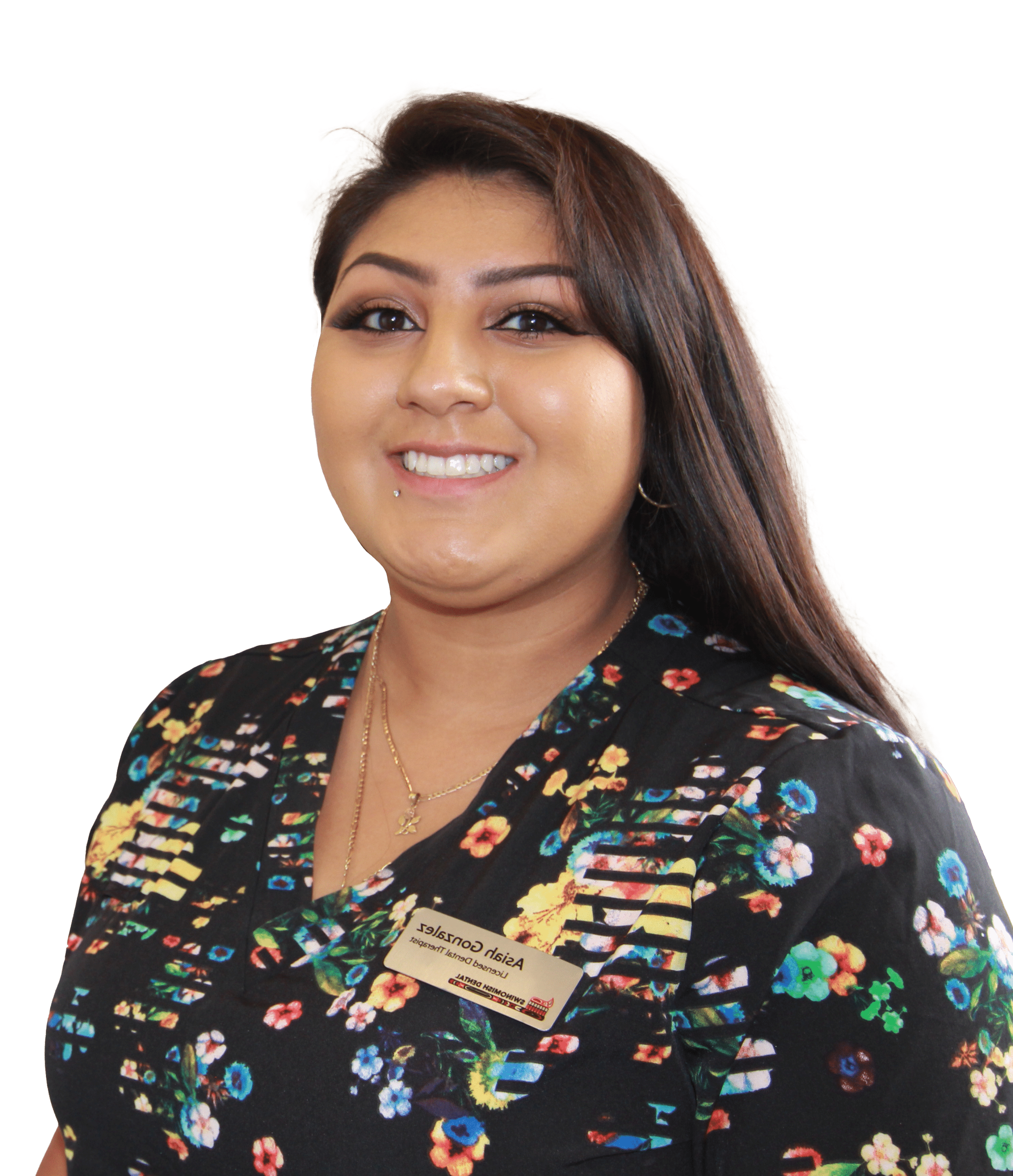 young dental therapist smiling at the camera