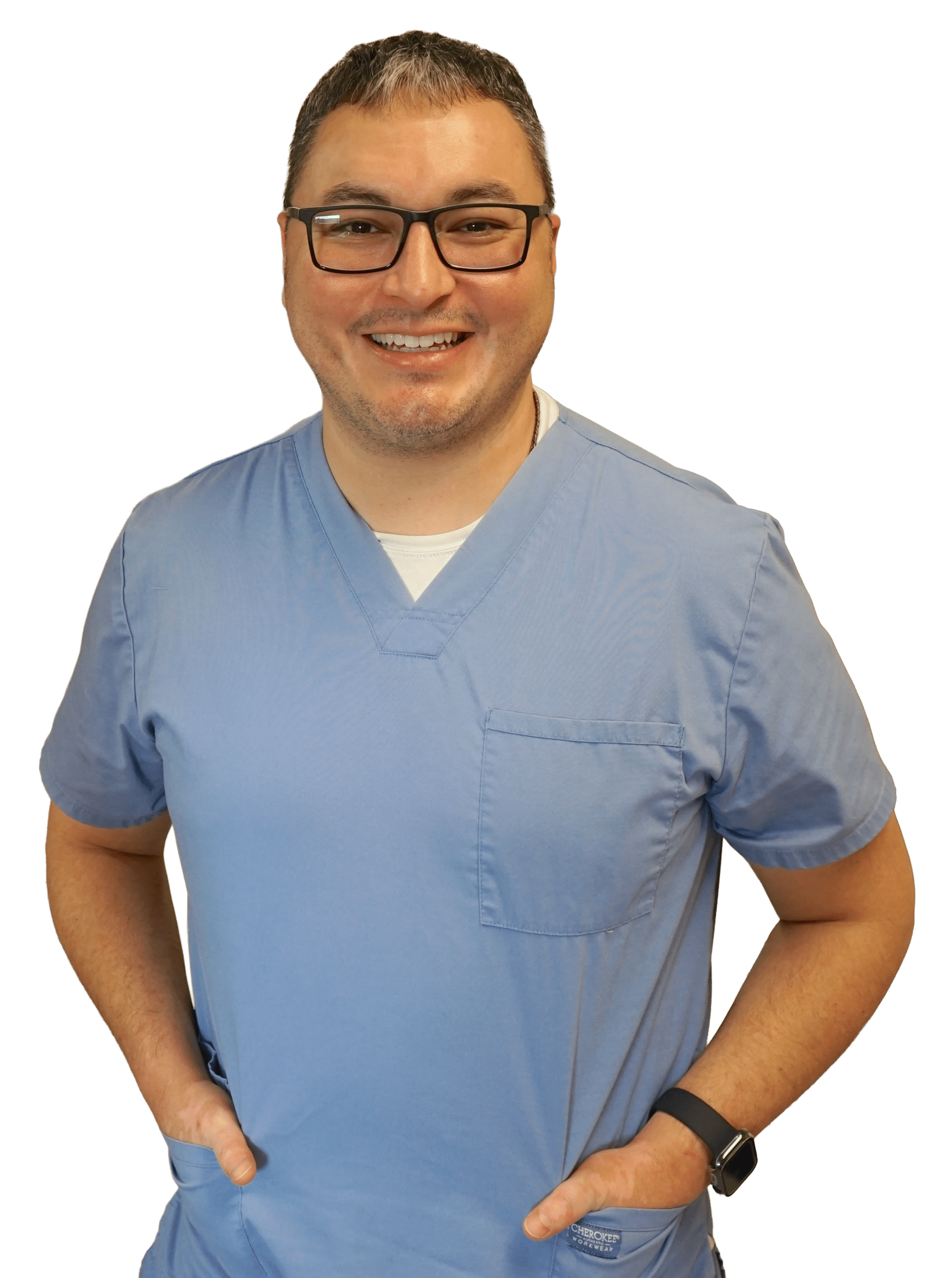 dental therapist smiling with hands in his pocket